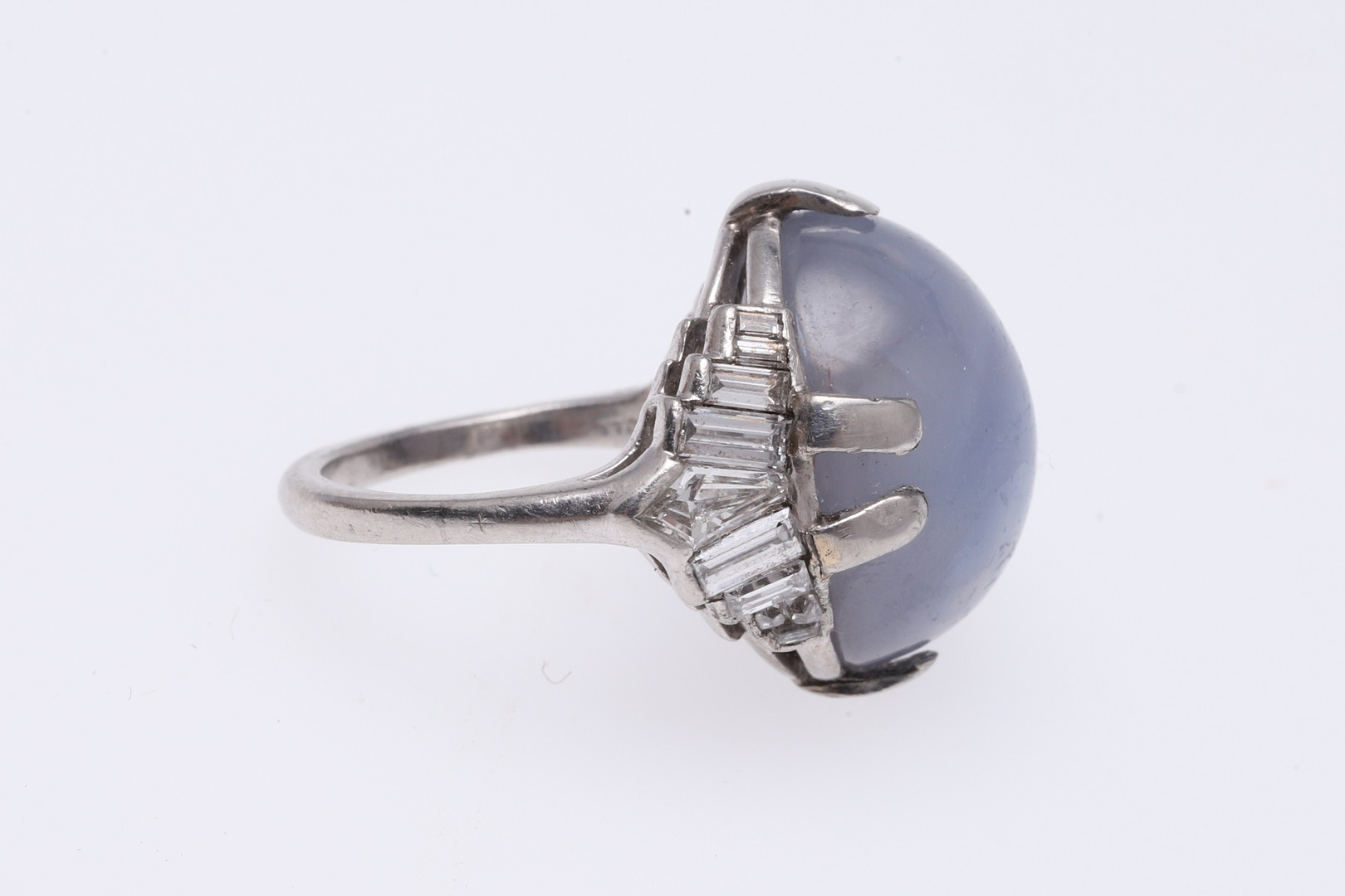 A STAR SAPPHIRE AND DIAMOND RING BY J.E. CALDWELL. - Image 4 of 5