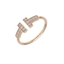 A DIAMOND AND 18CT ROSE GOLD 'T' RING BY TIFFANY & CO.