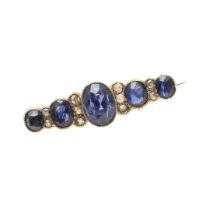 A SAPPHIRE AND DIAMOND BROOCH.