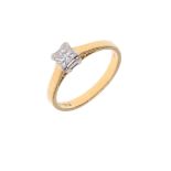 A DIAMOND SOLITAIRE RING.