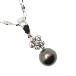 A DIAMOND AND CULTURED PEARL PENDANT.
