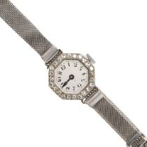 A LADY'S DIAMOND COCKTAIL WRISTWATCH.