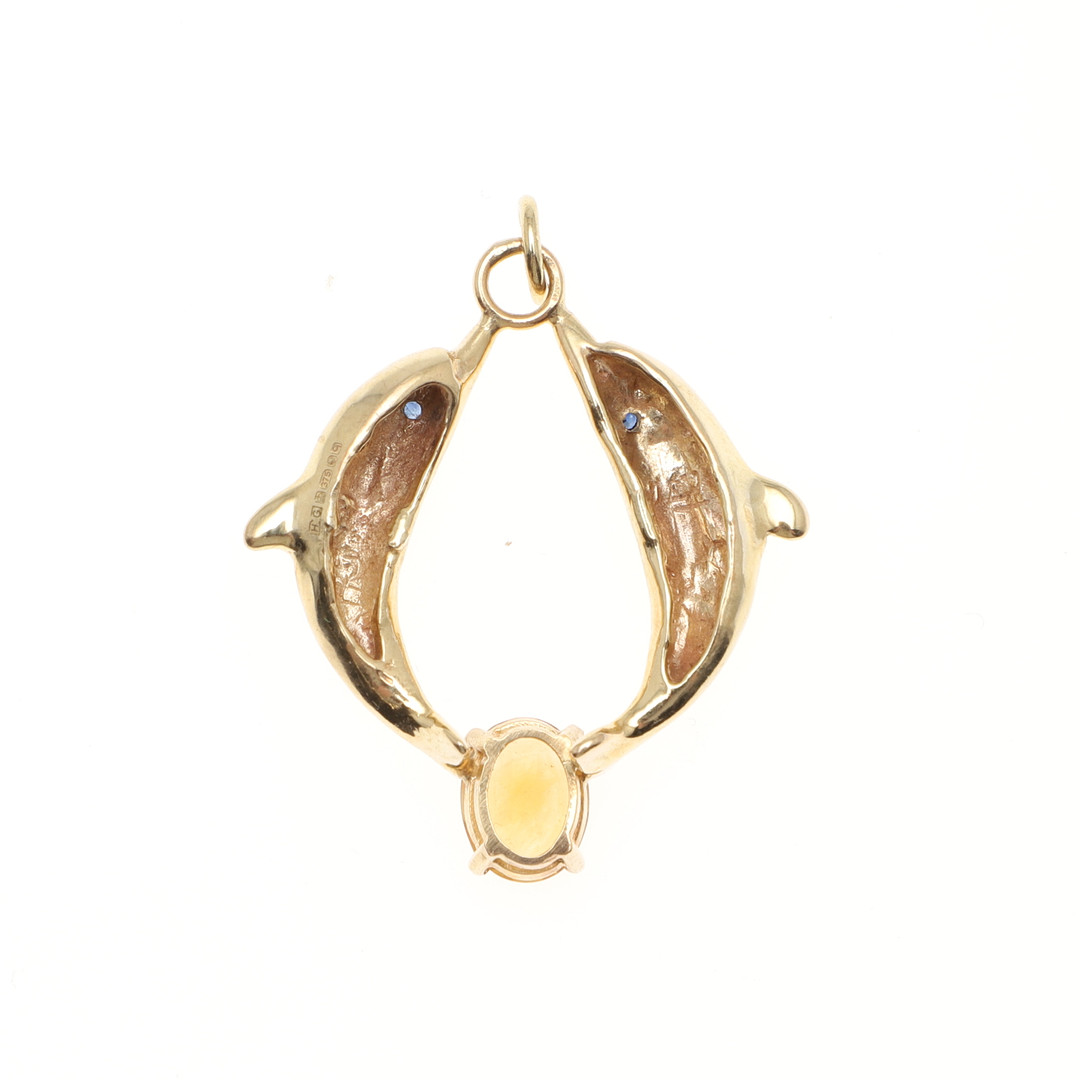 A 9CT GOLD AND GEM SET DOLPHIN PENDANT BY HARRIET GLEN. - Image 2 of 2