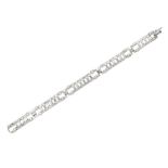 AN ART DECO DIAMOND AND PLATINUM LADDER BRACELET.