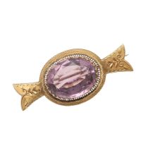 A VICTORIAN AMETHYST AND 18CT GOLD BROOCH.