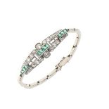 AN ART DECO EMERALD AND DIAMOND BRACELET.