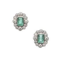 A PAIR OF EMERALD AND DIAMOND STUD EARRINGS.