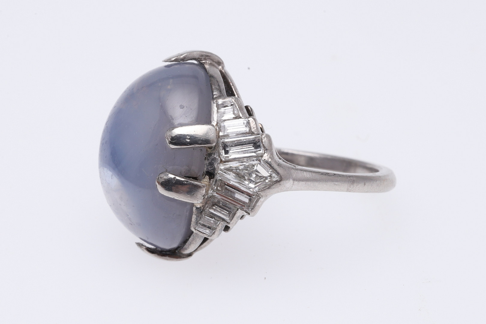 A STAR SAPPHIRE AND DIAMOND RING BY J.E. CALDWELL. - Image 2 of 5