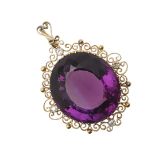 AN AMETHYST AND DIAMOND PENDANT.