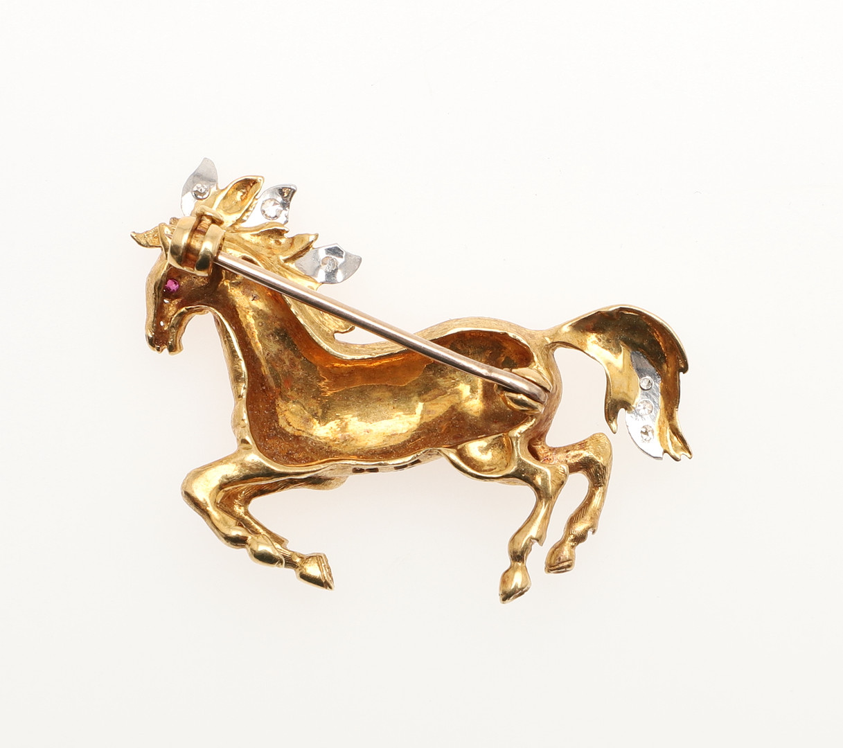 AN 18CT GOLD AND DIAMOND GALLOPING HORSE BROOCH. - Image 2 of 2