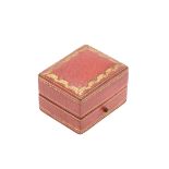 AN ANTIQUE RED LEATHER EARRING JEWELLERY BOX BY CARTIER.
