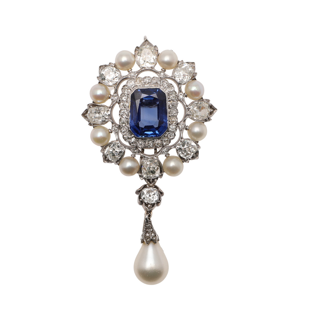 A SAPPHIRE AND NATURAL PEARL PENDANT, CONVERTING INTO A BRACELET AND A BROOCH.