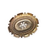 A VICTORIAN 15CT GOLD AND DIAMOND BROOCH.