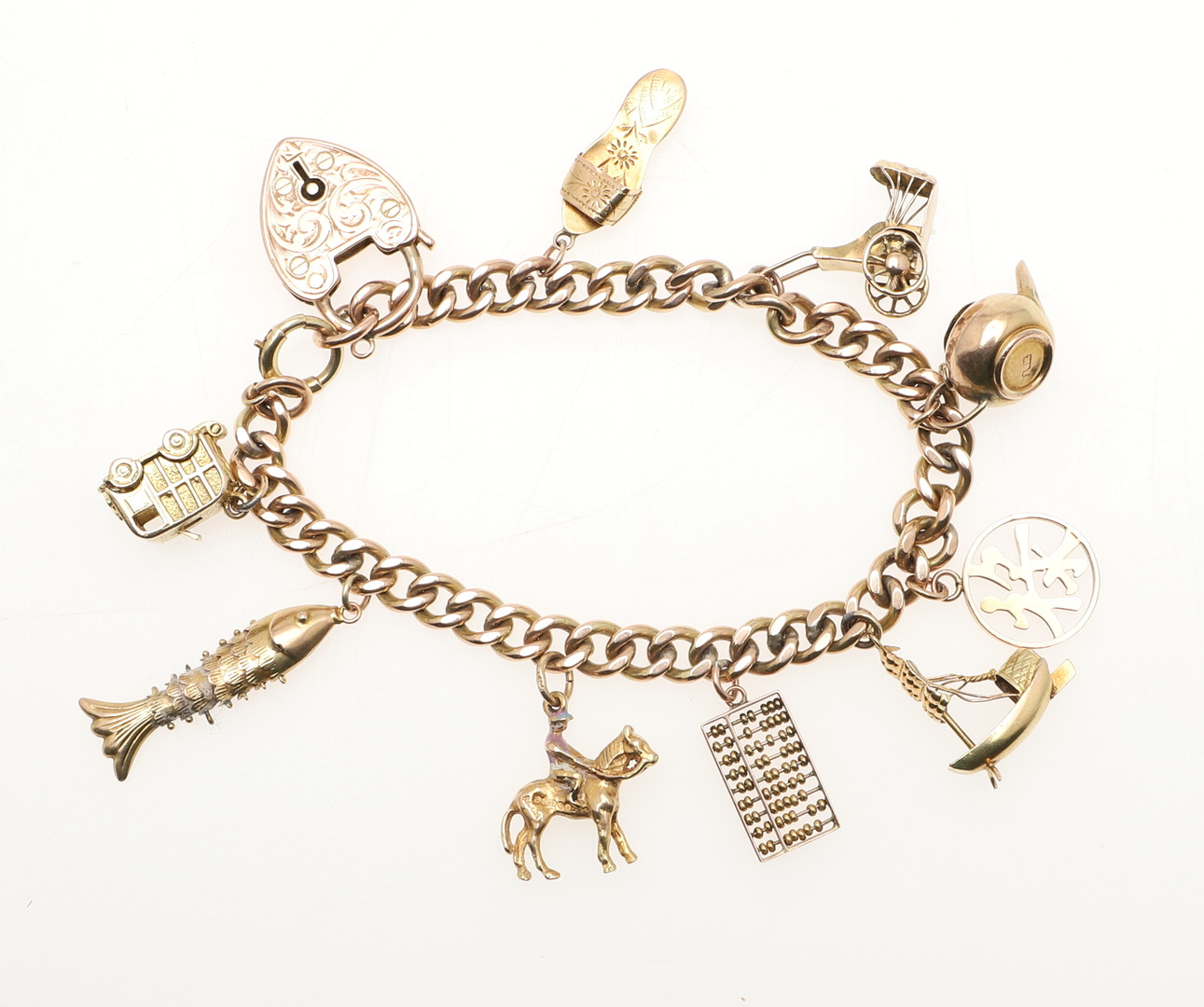 A GOLD CURB LINK BRACELET. - Image 2 of 2