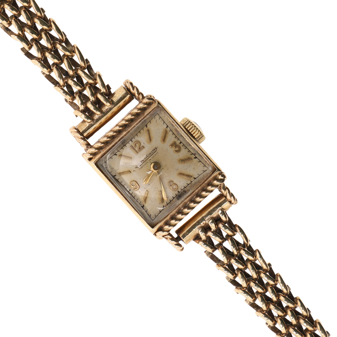 A LADY'S 9CT GOLD WRISTWATCH BY JAEGER-LeCOULTRE.