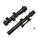 A BUSHNELL CUSTOM 25X GUN SIGHT AND ANOTHER SIMILAR.