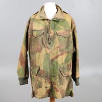 A DENISON SMOCK, SIZE 4, DATED 1956.