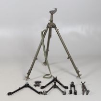A MILITARY MACHINE GUN TRIPOD AND A COLLECTION OF SMALLER BARREL SUPPORTS.
