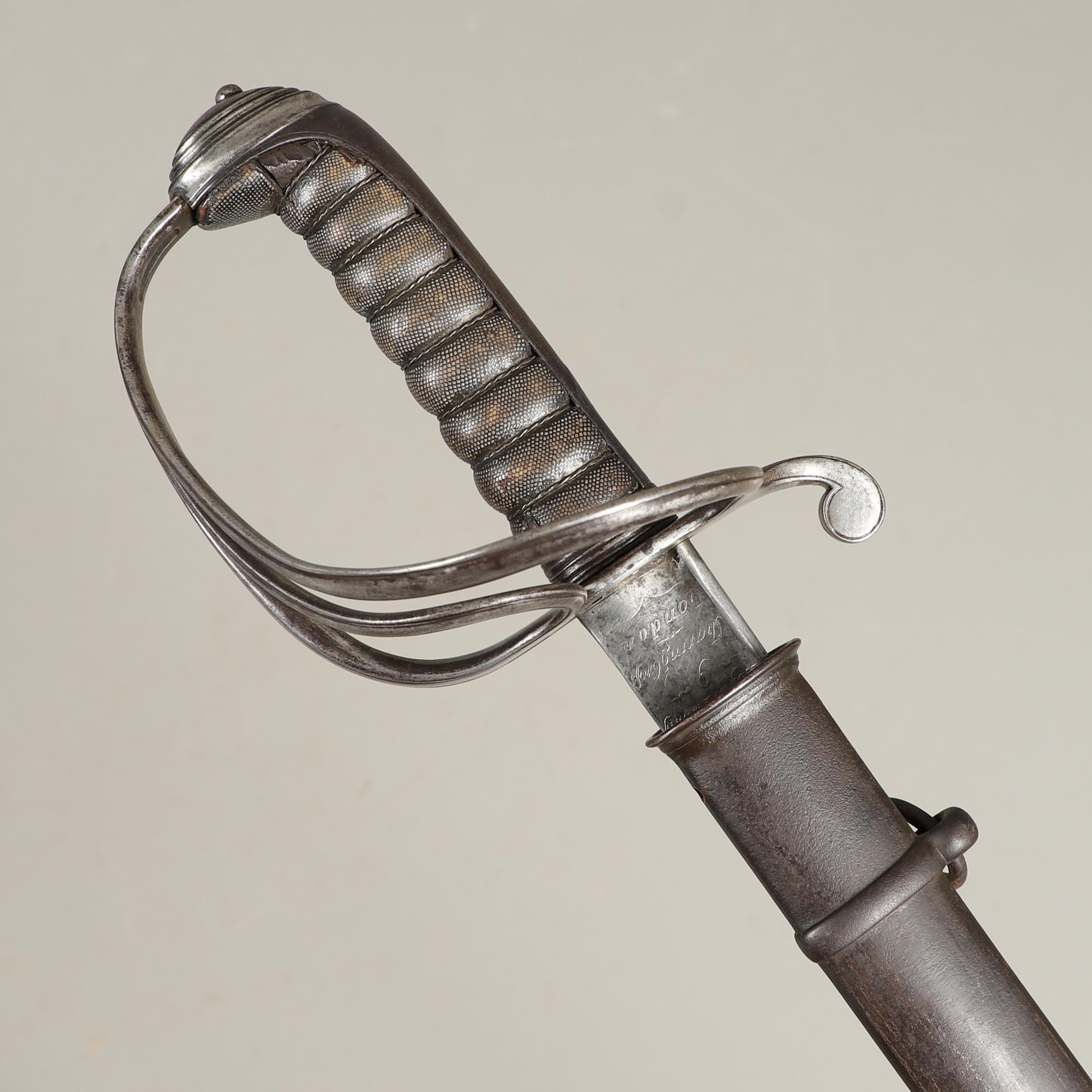 A CRIMEA PERIOD 1822 PATTERN LIGHT CAVALRY OFFICER'S SWORD AND SCABBARD.