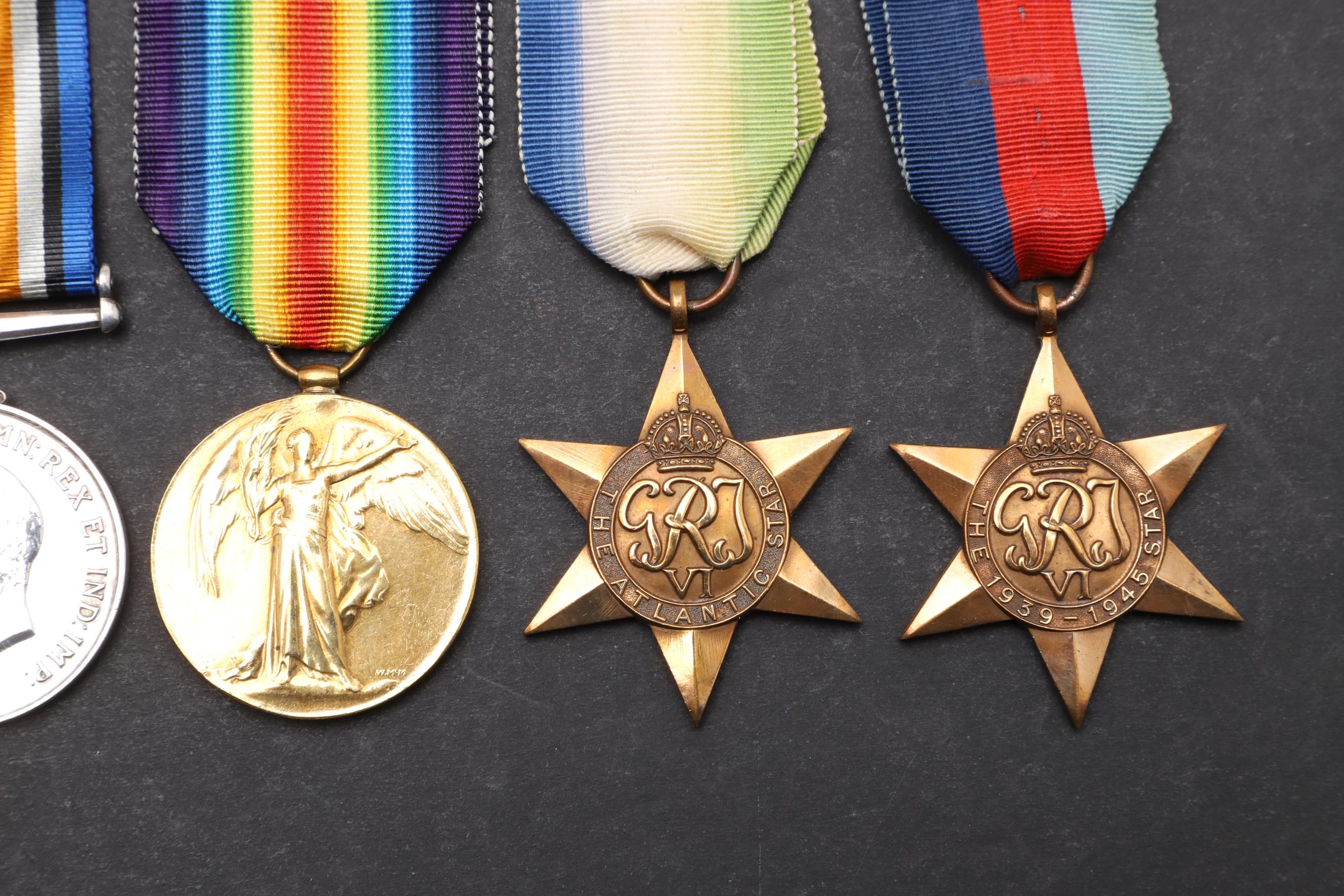 A FIRST WORLD WAR SILVER WAR BADGE AND A SMALL COLLECTION OF MEDALS. - Image 3 of 7