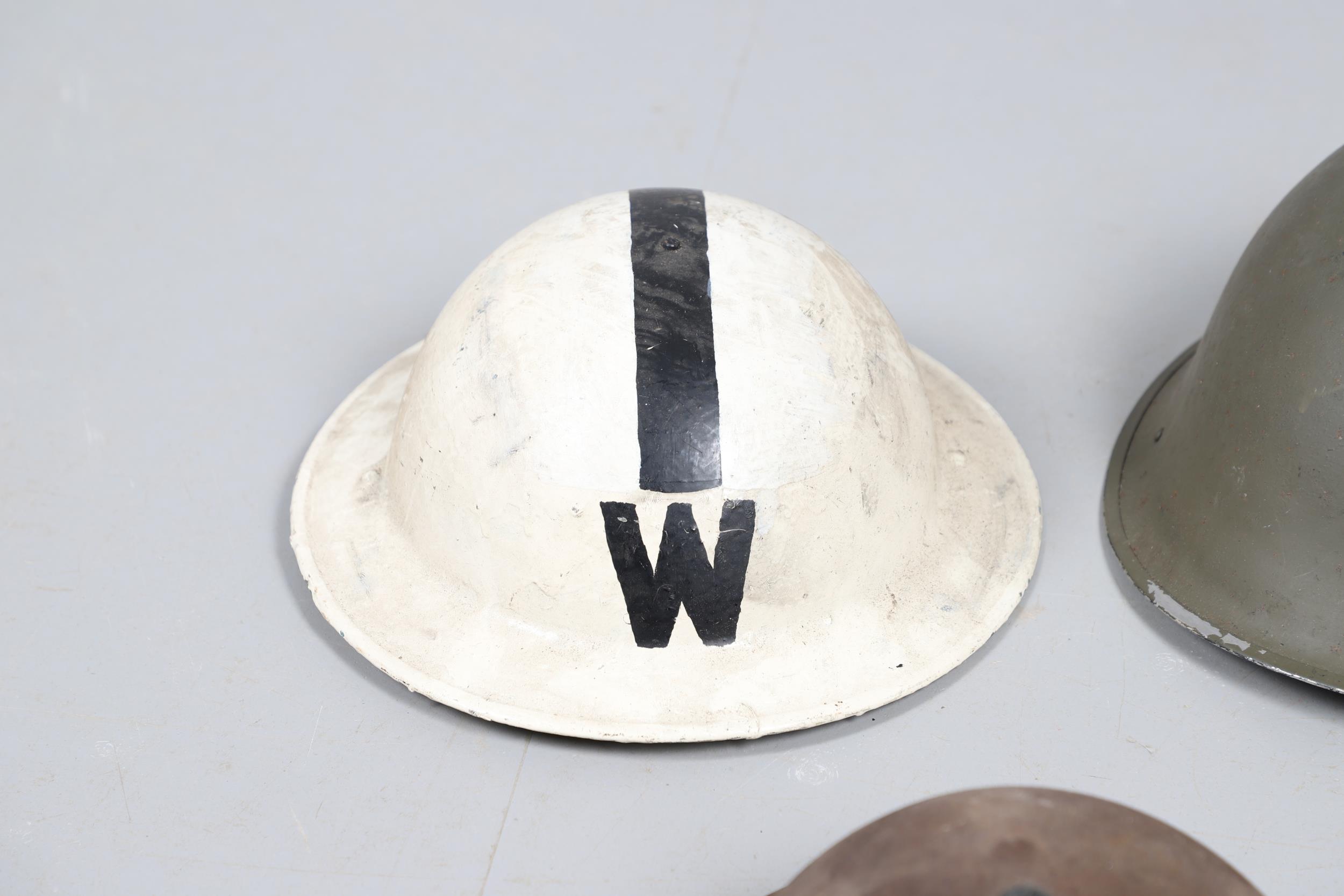 A COLLECTION OF SECOND WORLD WAR HOME FRONT HELMETS. - Image 2 of 17
