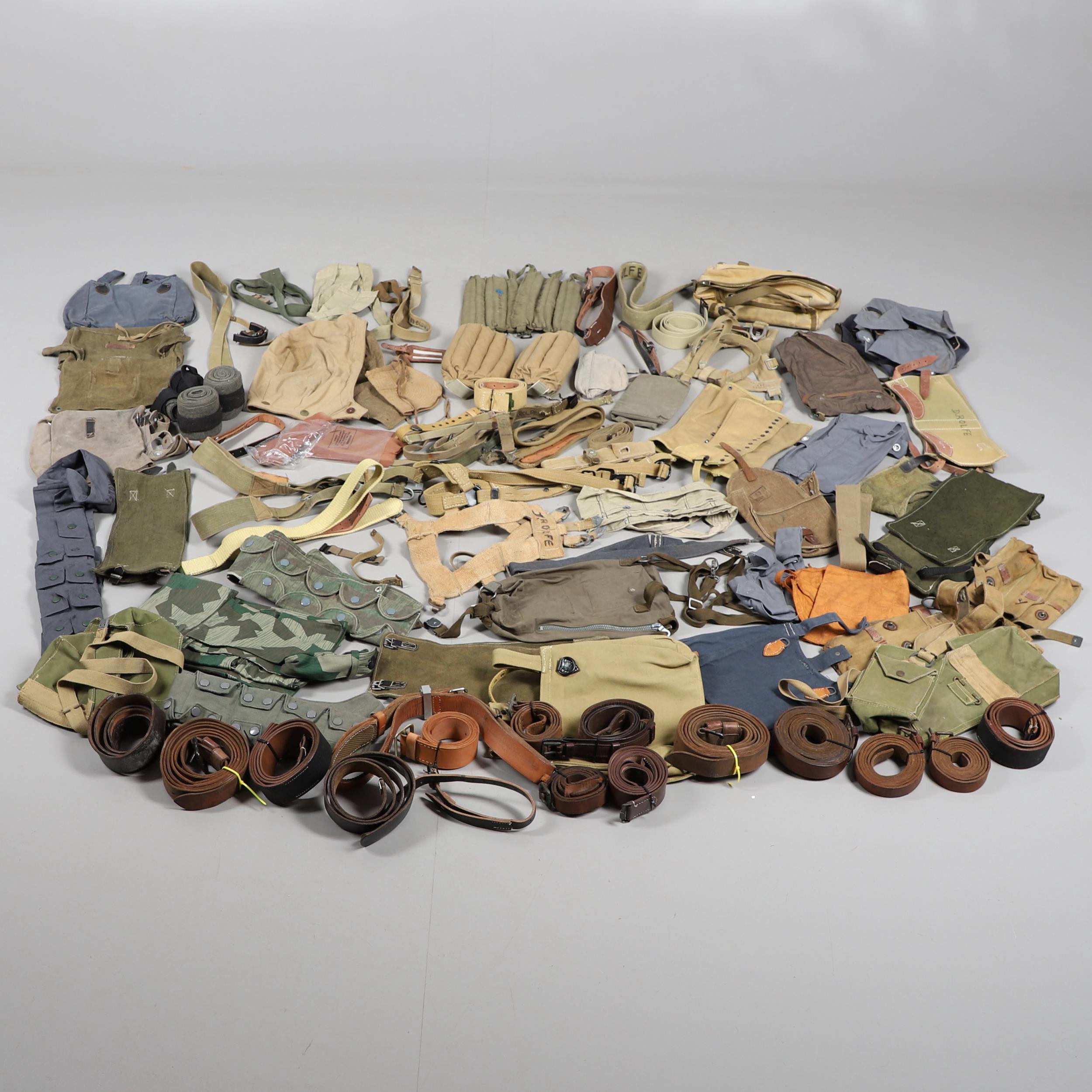 A LARGE COLLECTION OF WEBBING BELTS, KNEE PADS AND OTHER UNIFORM ITEMS, SECOND WORLD WAR AND LATER.