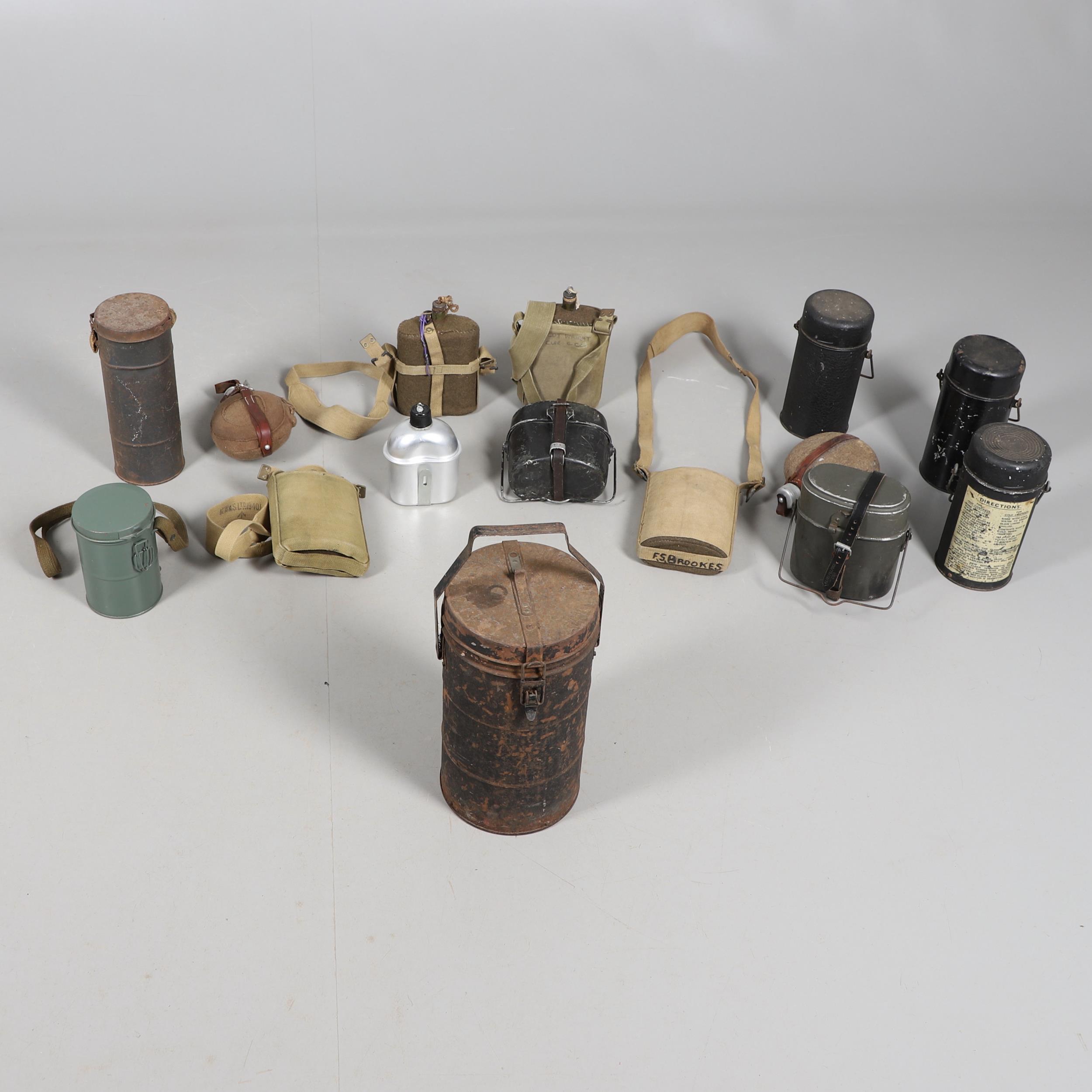 A COLLECTION OF FIRST WORLD WAR BRITISH TYPE WATER BOTTLES AND OTHER SIMILAR ITEMS.