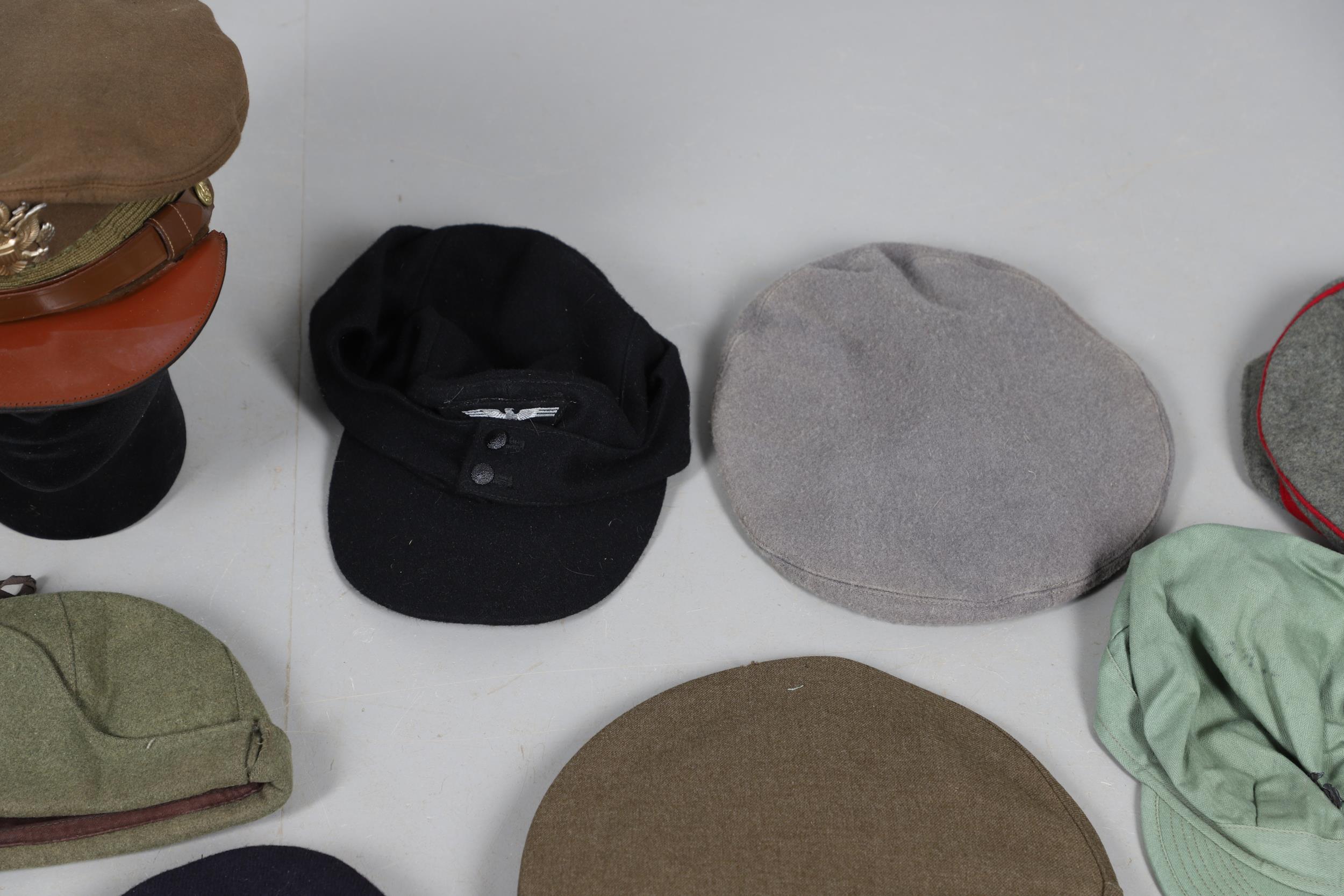 AN EXTENSIVE COLLECTION OF MILITARY UNIFORM CAPS, BERETS AND OTHER ITEMS. SECOND WORLD WAR AND LATER - Image 5 of 17