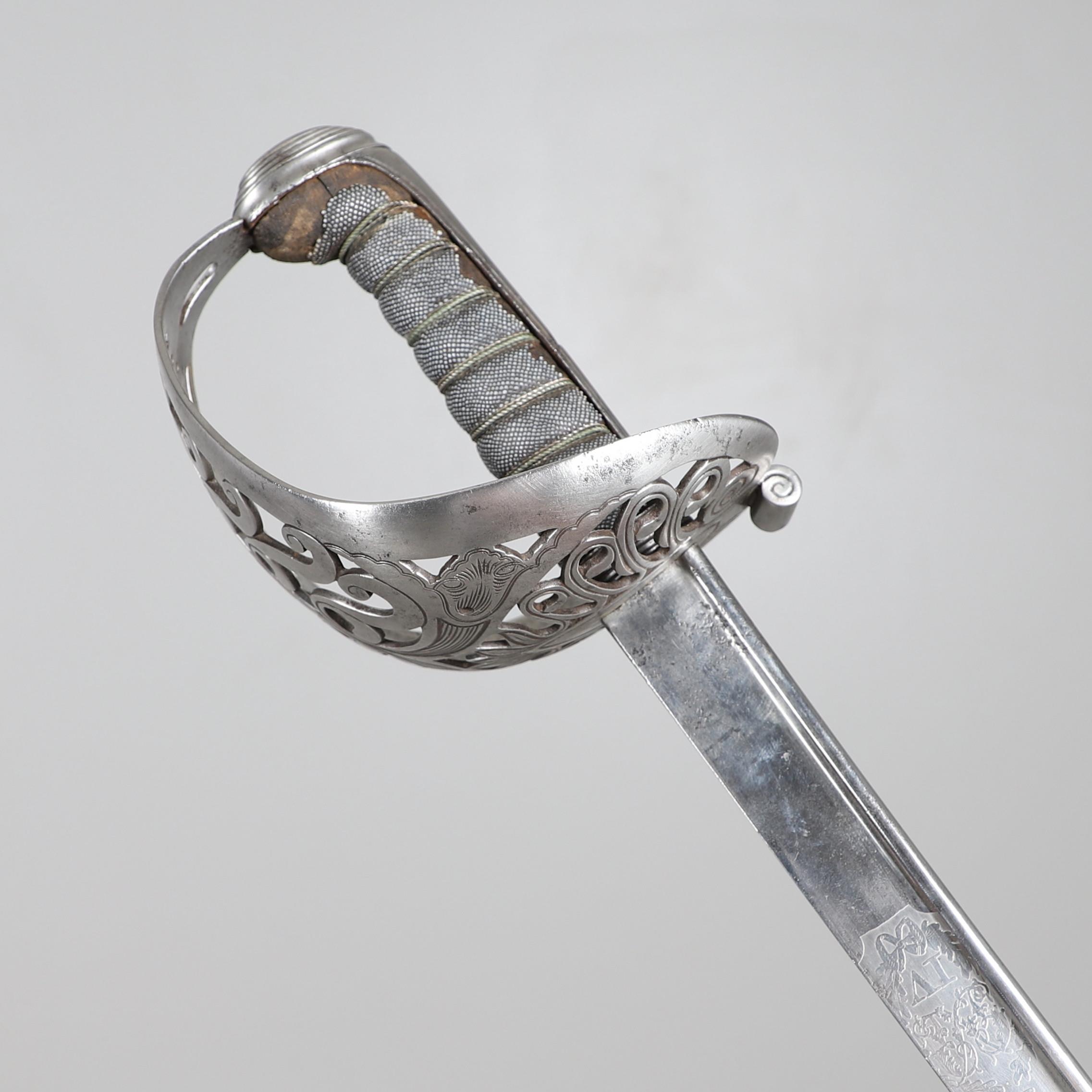 A GEORGE IV 1822 PATTERN HEAVY CAVALRY PATTERN SWORD BY ANDREWS OF PALL MALL.
