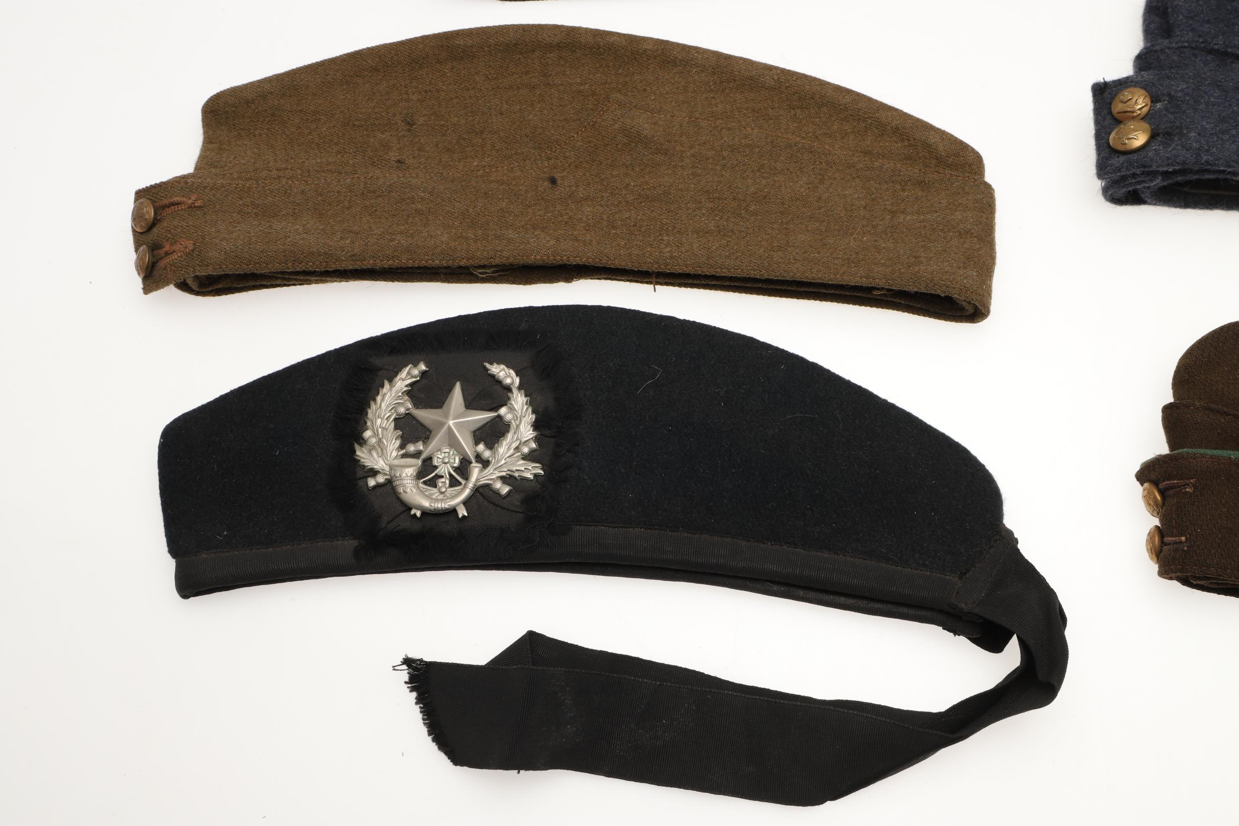 A COLLECTION OF EIGHT SECOND WORLD WAR AND LATER MILITARY ISSUE SIDE CAPS. - Image 6 of 7