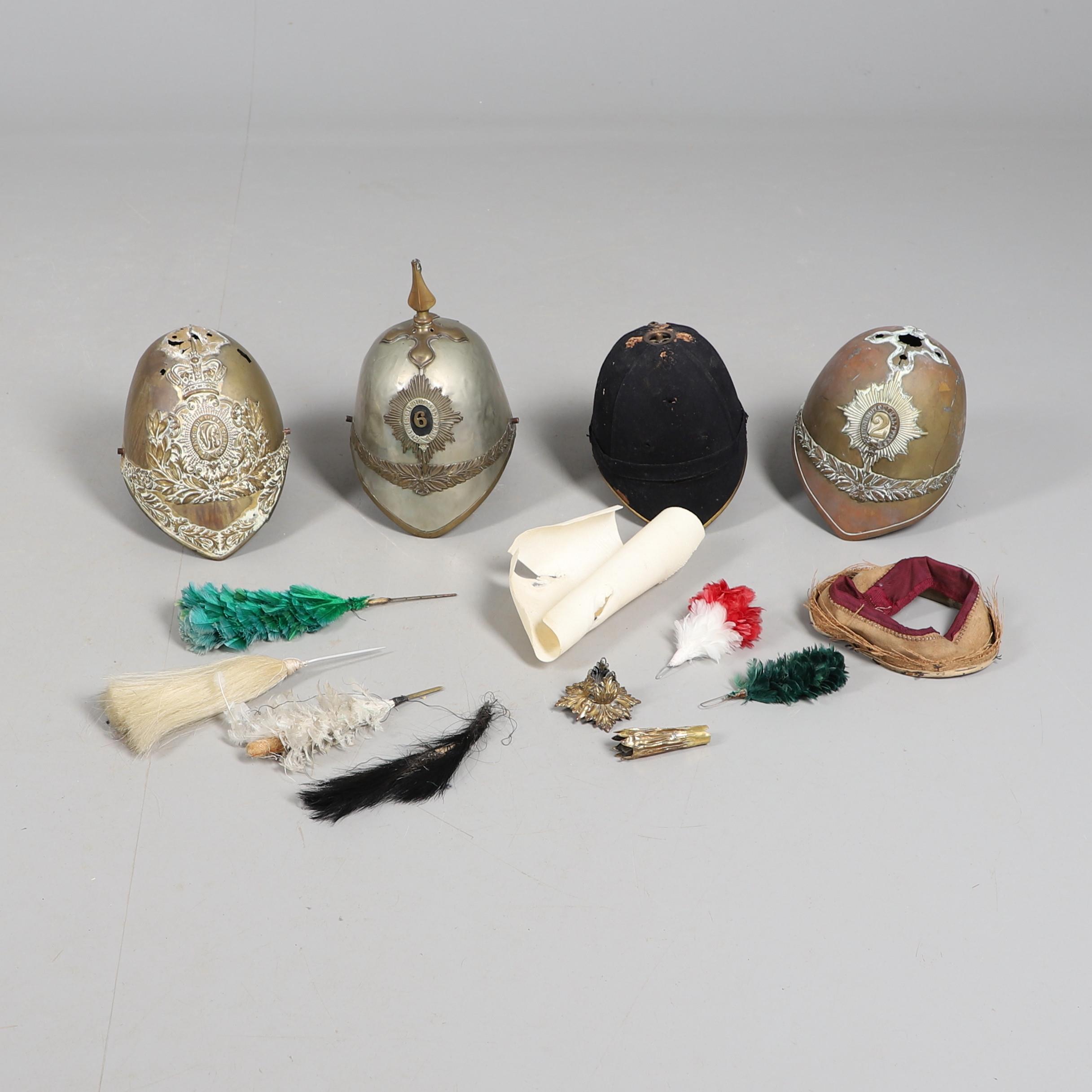 A COLLECTION OF VICTORIAN AND LATER HELMETS AND PARTS TO INCLUDE 1871 PATTERN SHELLS.