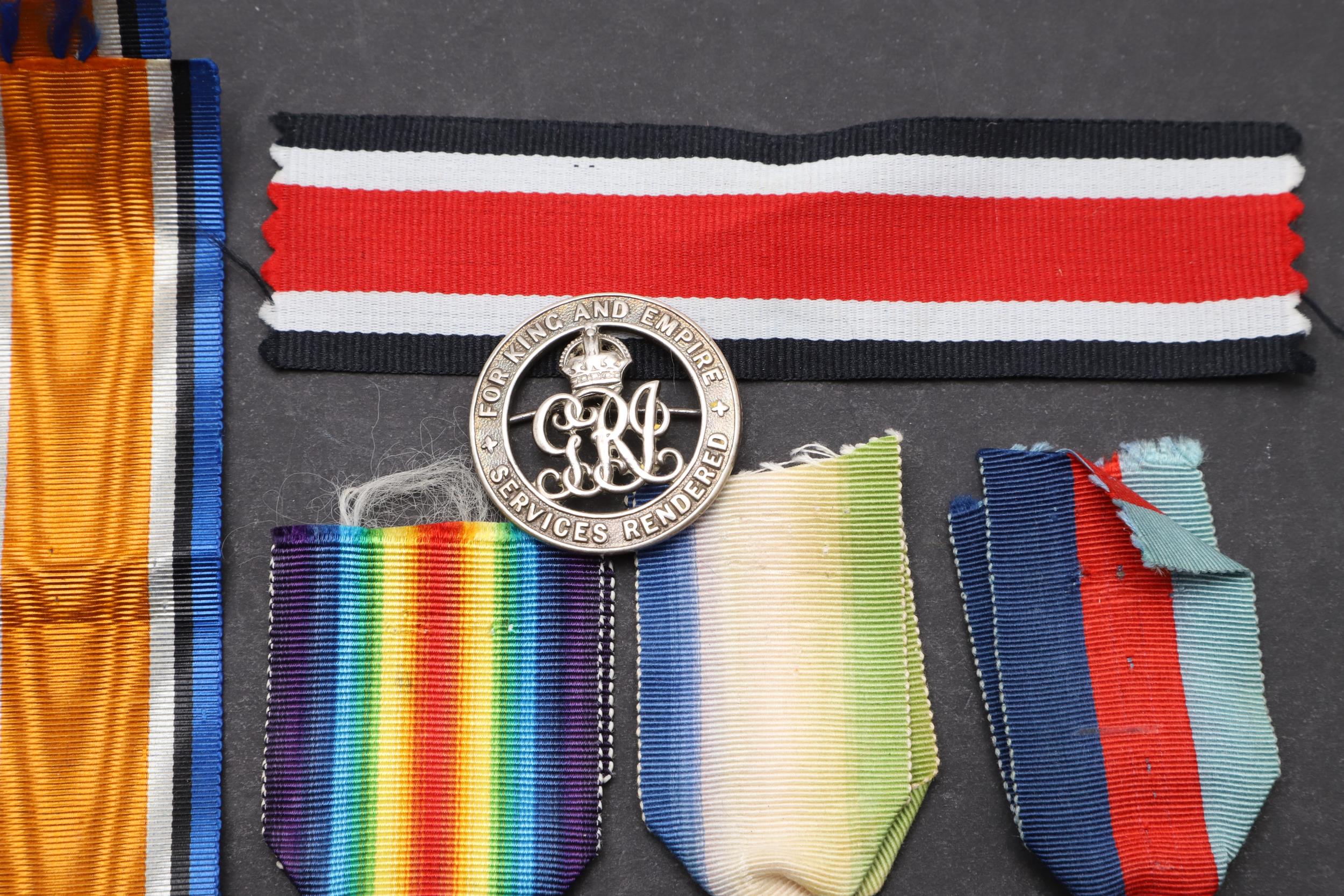 A FIRST WORLD WAR SILVER WAR BADGE AND A SMALL COLLECTION OF MEDALS. - Image 4 of 7