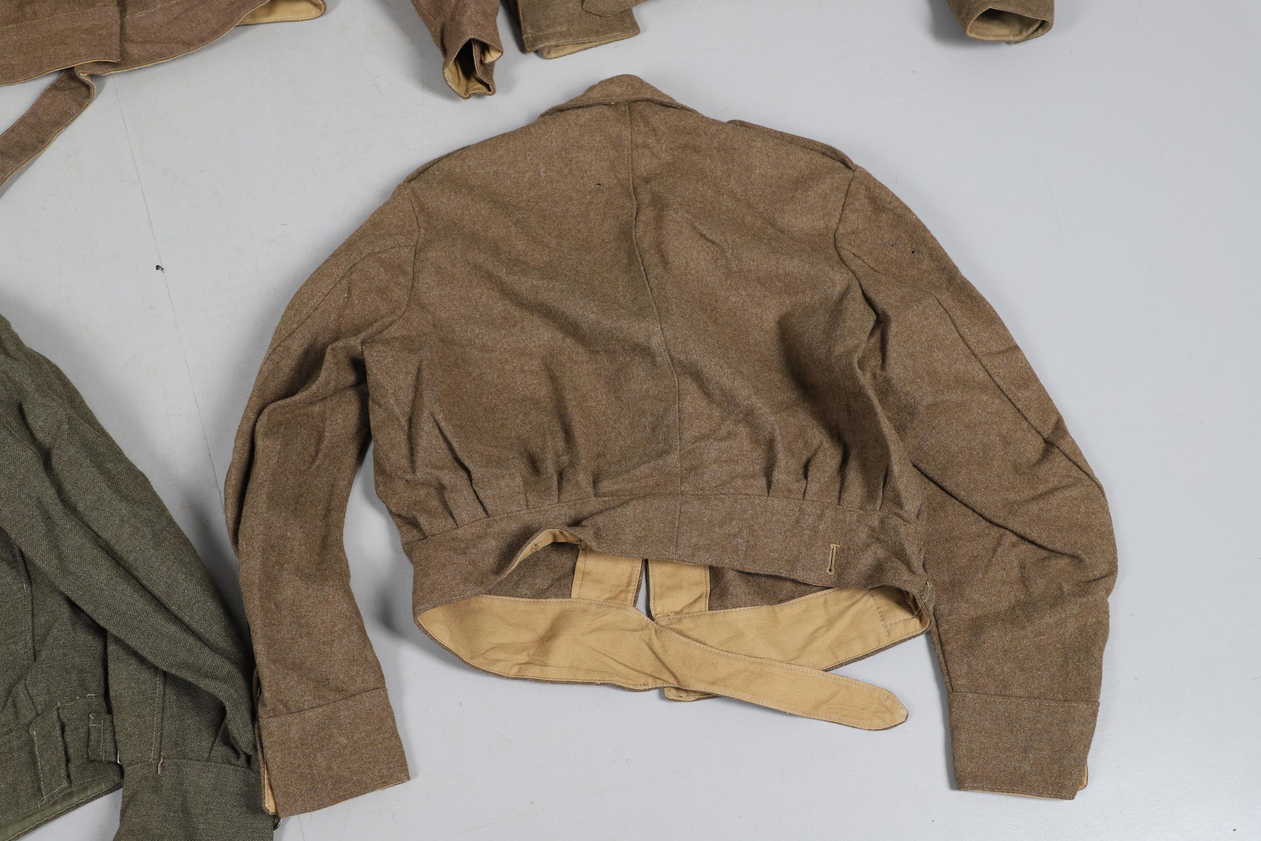 A COLLECTION OF FIVE SECOND WORLD WAR AND LATER BATTLEDRESS TUNICS. 1940 PATTERN AND SIMILAR. - Image 9 of 15
