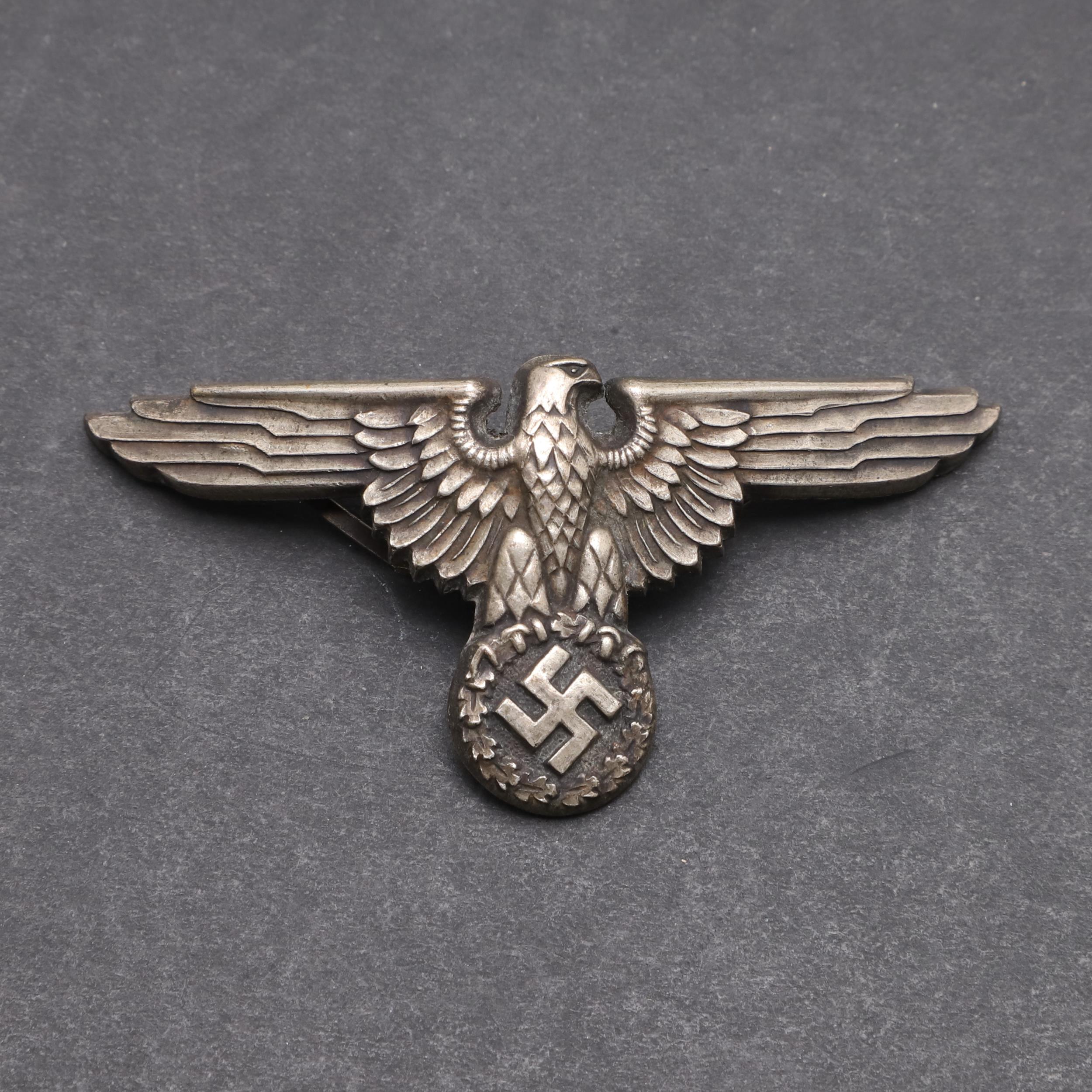 A SECOND WORLD WAR GERMAN SS OFFICER'S PEAKED CAP EAGLE. - Image 2 of 4