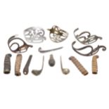 A COLLECTION OF SWORD FITTINGS TO INCLUDE GRIPS, GUARDS AND OTHERS.