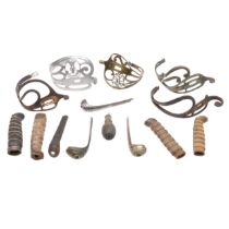 A COLLECTION OF SWORD FITTINGS TO INCLUDE GRIPS, GUARDS AND OTHERS.
