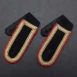 A PAIR OF SECOND WORLD WAR GERMAN WAFFEN-SS ARTILLERY SHOULDER STRAPS.