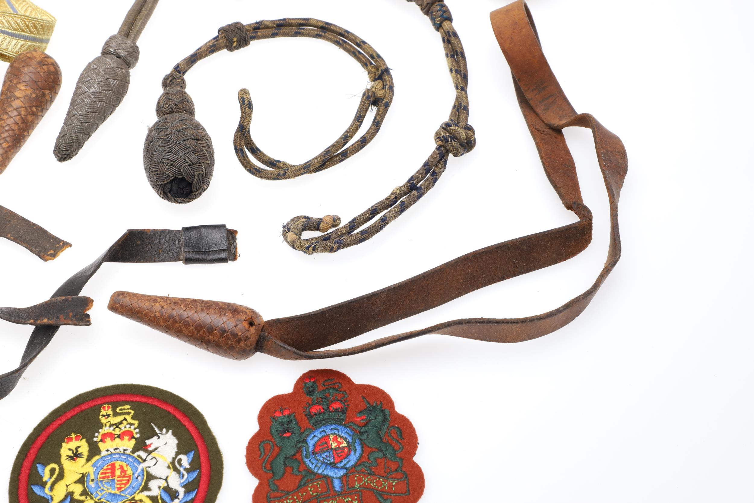 A COLLECTION OF SWORD KNOTS AND MILITARY BADGES. - Image 11 of 11