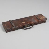 A LEATHER GUN CASE WITH LABEL FOR WILLIAM POWELL AND SONS.