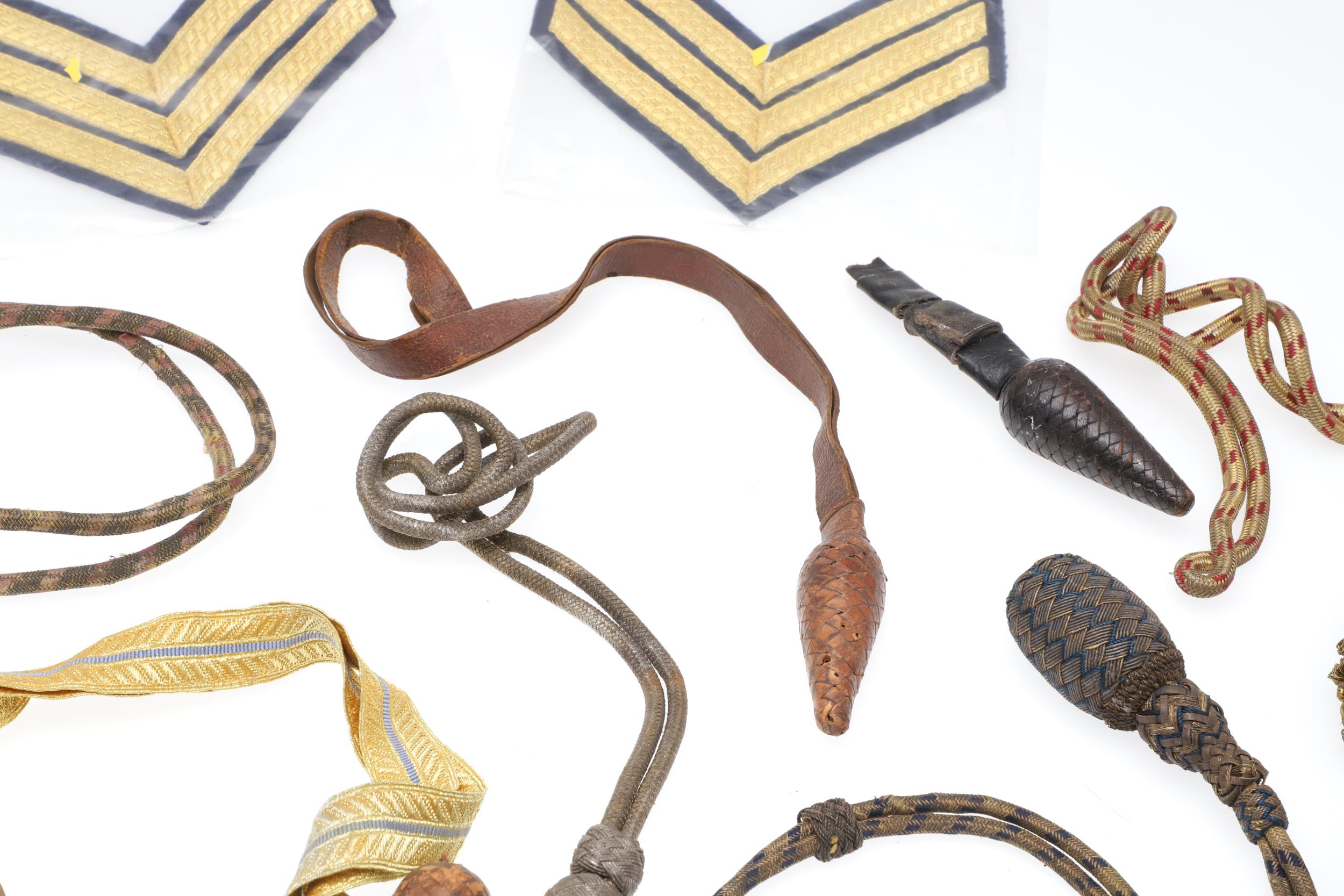A COLLECTION OF SWORD KNOTS AND MILITARY BADGES. - Image 4 of 11