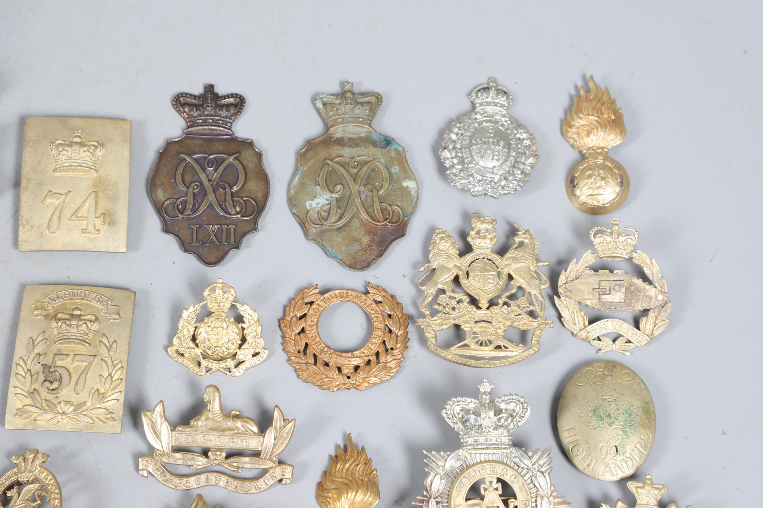 A COLLECTION OF VICTORIAN STYLE HELMET PLATES AND OTHER BADGES. - Image 2 of 10