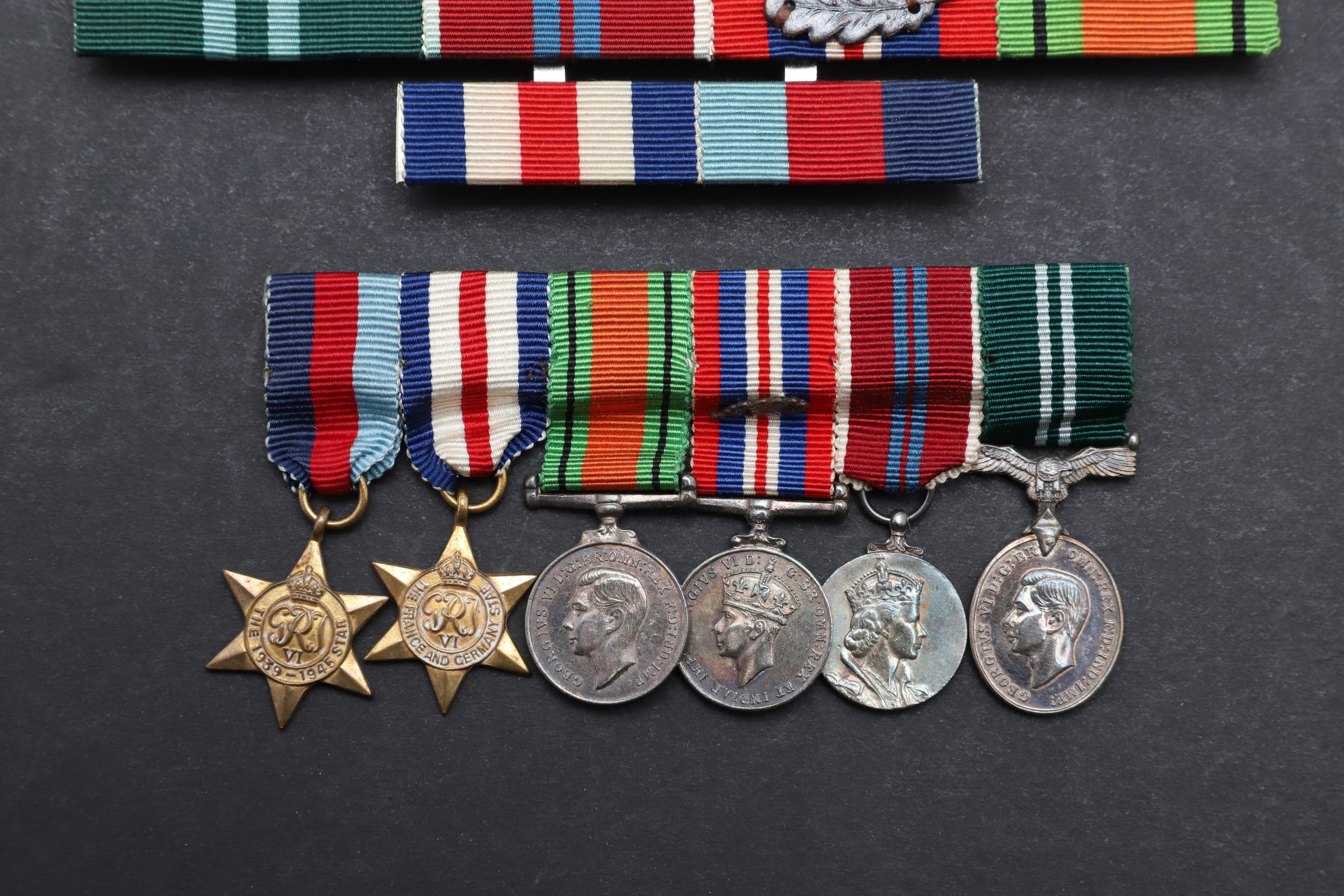 A TERRITORIAL EFFICIENCY MEDAL, A SET OF MINIATURES AND RIBBON BARS. - Image 2 of 17