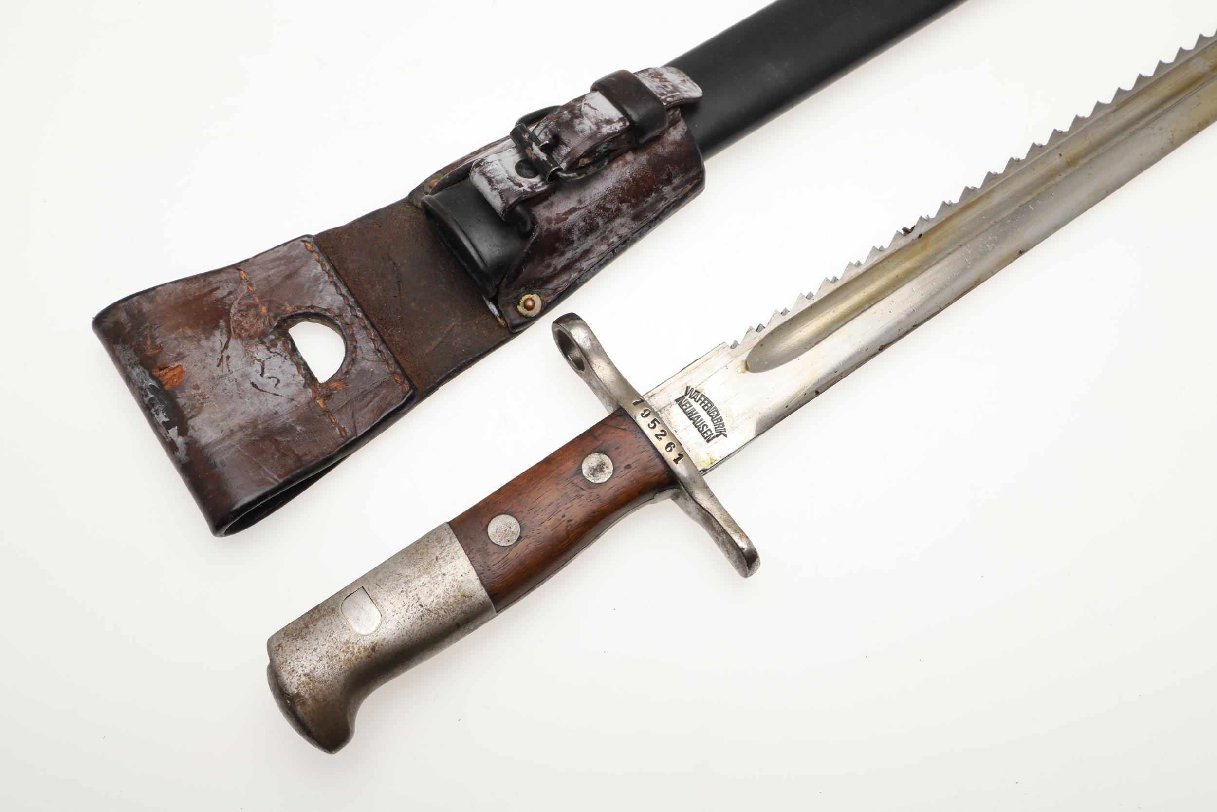 A SWISS 1889 PATTERN SAWBACK BAYONET AND SCABBARD. - Image 4 of 10