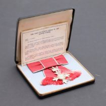 A LADIES MBE IN FITTED CASE.