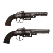 AN UNUSUAL PAIR OF MID 19TH CENTURY 80 BORE TRANSITIONAL REVOLVERS.