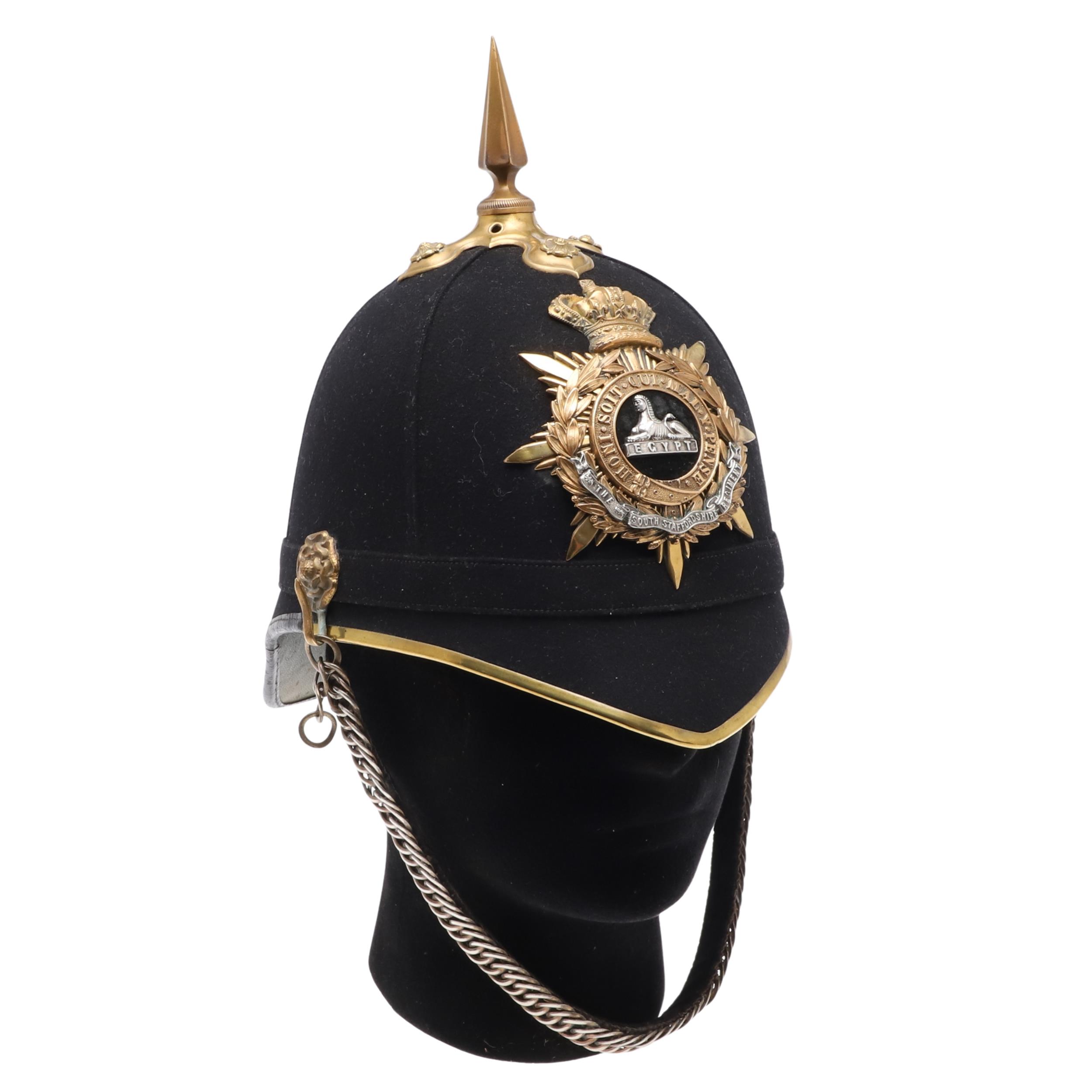 A SOUTH STAFFORDSHIRE REGIMENT OFFICER'S BLUE CLOTH HOME SERVICE HELMET.