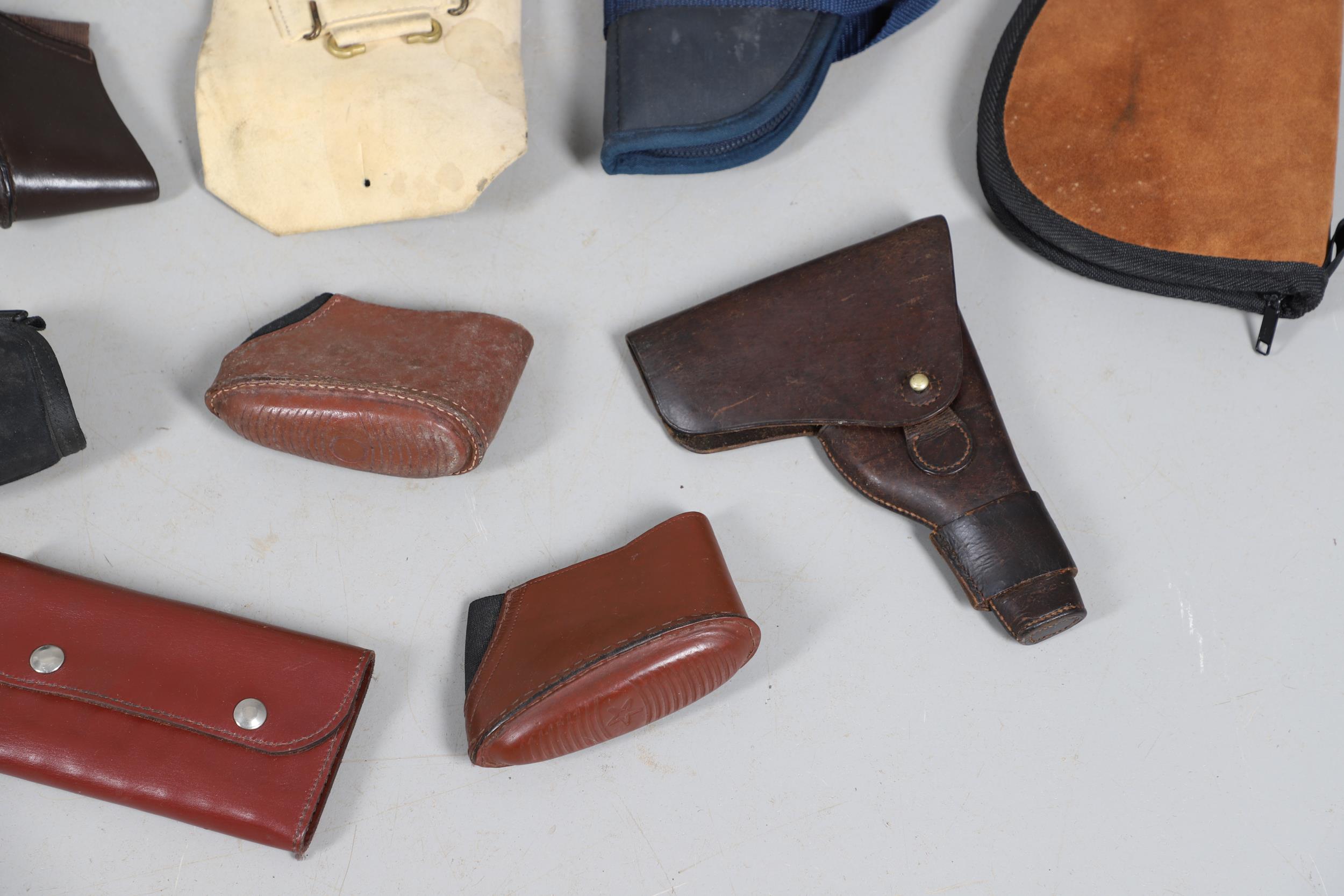 A BROWN LEATHER PISTOL HOLSTER AND OTHERS SIMILAR. - Image 5 of 6