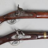 A 19TH CENTURY ENFIELD TYPE PERCUSSION FIRING RIFLE AND ANOTHER SIMILAR.