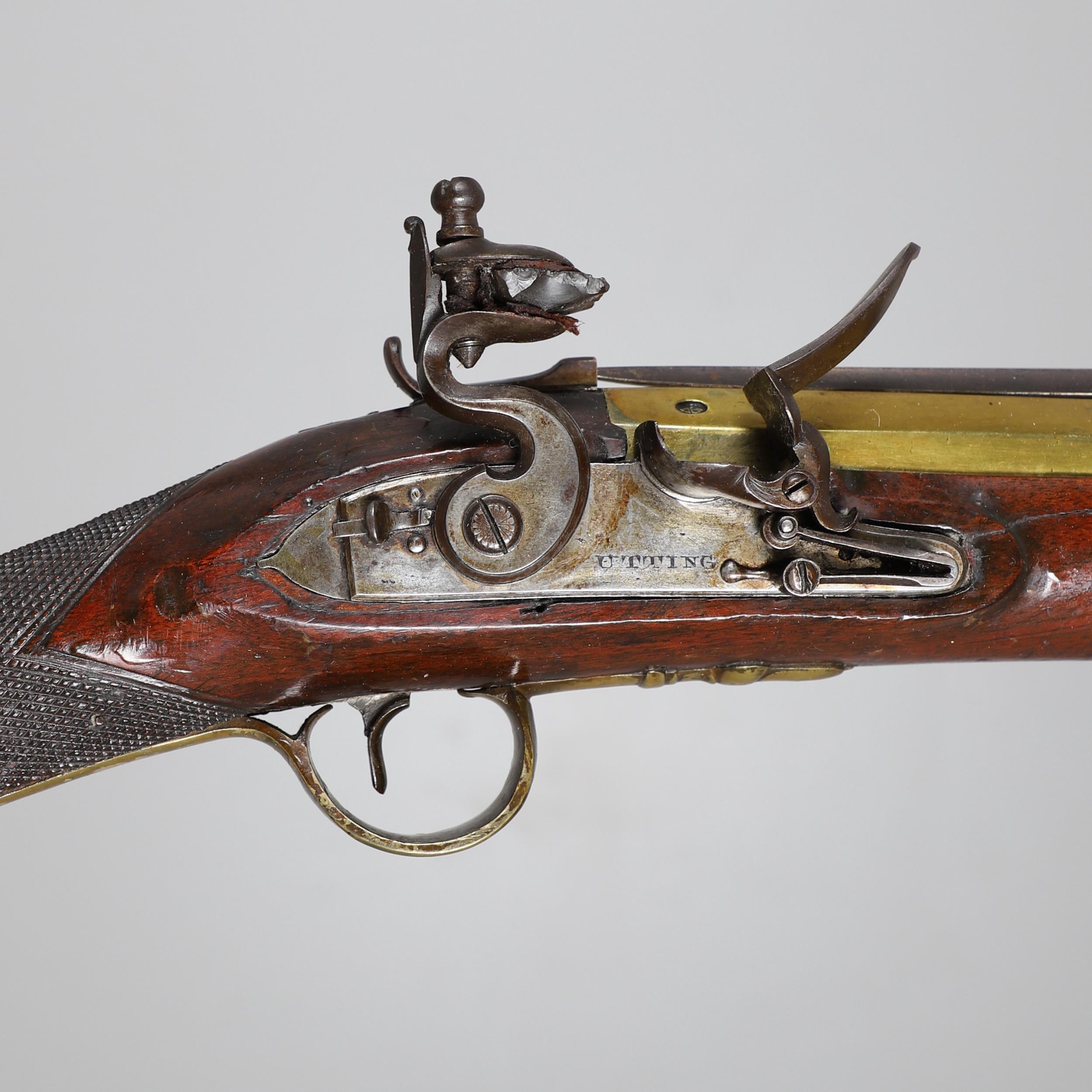 AN EARLY 19TH CENTURY BLUNDERBUSS MARKED FOR UTTING OF LONDON.