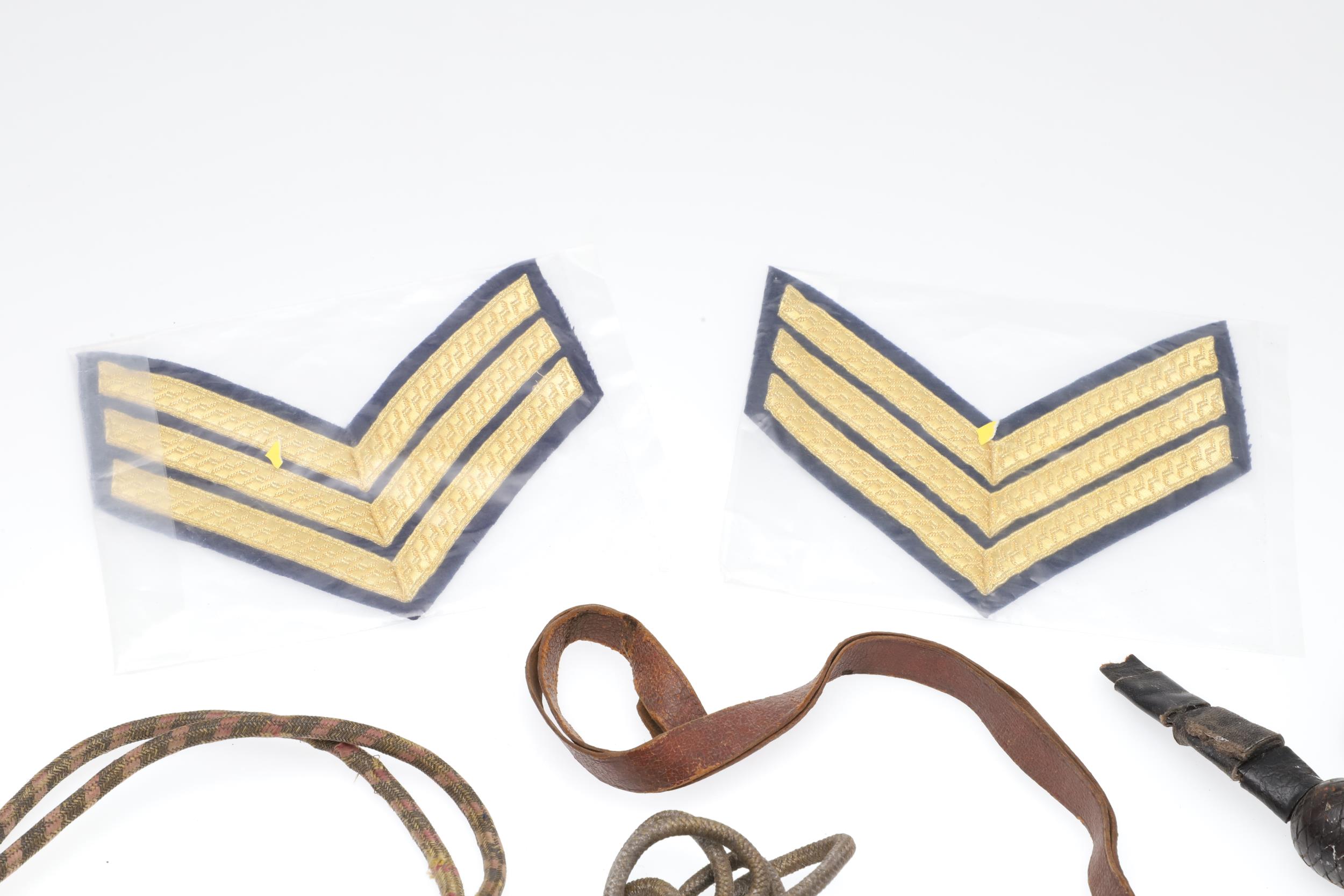 A COLLECTION OF SWORD KNOTS AND MILITARY BADGES. - Image 2 of 11